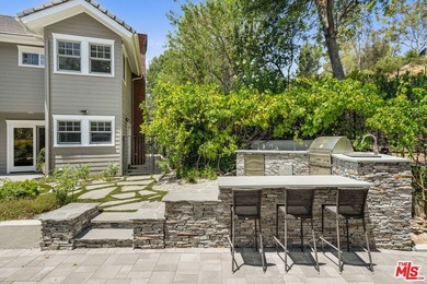 Nestled on a sprawling, park-like acre within the prestigious - photo 42