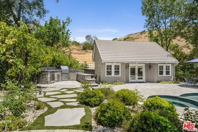 Nestled on a sprawling, park-like acre within the prestigious - photo 43