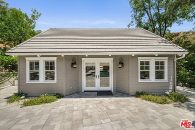 Nestled on a sprawling, park-like acre within the prestigious - photo 44
