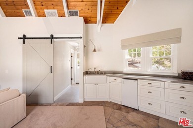 Nestled on a sprawling, park-like acre within the prestigious - photo 47