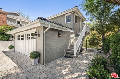 Nestled on a sprawling, park-like acre within the prestigious - photo 50