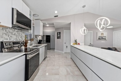 Newly Renovated High End Waterfront Home New Roof, Kitchen - photo 16