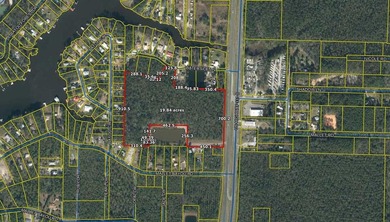 Zoned Rural Village with 700ft fronting Hwy 331 & also 120 ft - photo 1