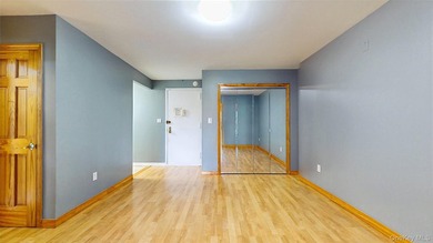 Experience easy living in the heart of Middle Village with this - photo 3