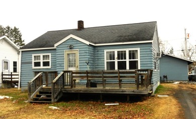 Nice little home in Littlefork with spacious garage/shop in the - photo 1