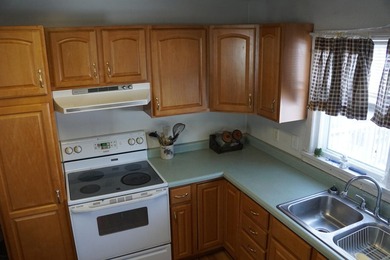 Nice little home in Littlefork with spacious garage/shop in the - photo 3