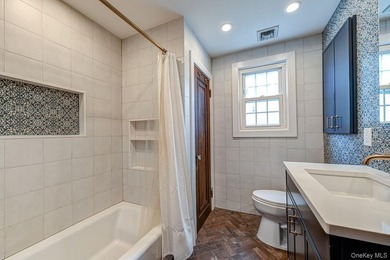 Oozing with charm this meticulously maintained brick Tudor is a - photo 19