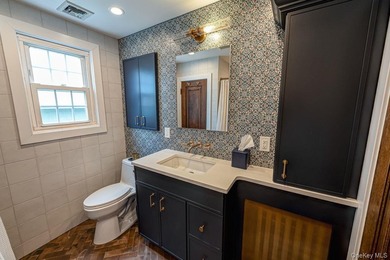 Oozing with charm this meticulously maintained brick Tudor is a - photo 20