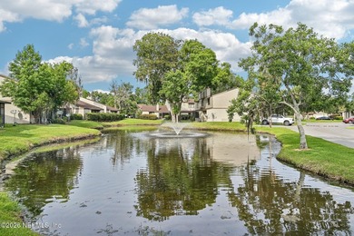 Tucked quietly behind the trees and overlooking a peaceful pond - photo 21