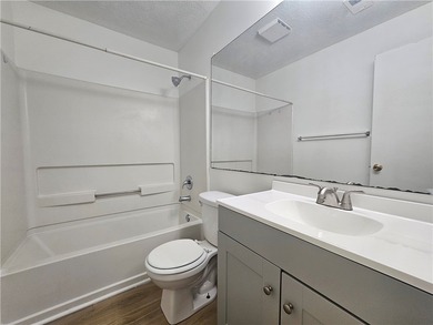 Check out this updated 4 bed, 2 bath condominium in the heart of - photo 11