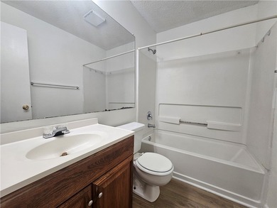 Check out this updated 4 bed, 2 bath condominium in the heart of - photo 12