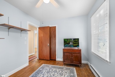 Welcome to 108 Belmont Circle -- a charming 3 or 4 bedroom, 1