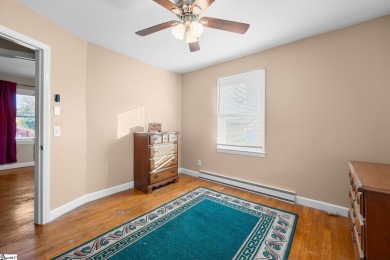 Welcome to 108 Belmont Circle -- a charming 3 or 4 bedroom, 1