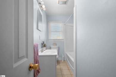 Welcome to 108 Belmont Circle -- a charming 3 or 4 bedroom, 1