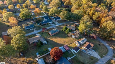 Welcome to 108 Belmont Circle -- a charming 3 or 4 bedroom, 1