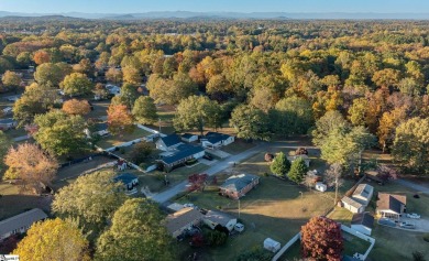 Welcome to 108 Belmont Circle -- a charming 3 or 4 bedroom, 1