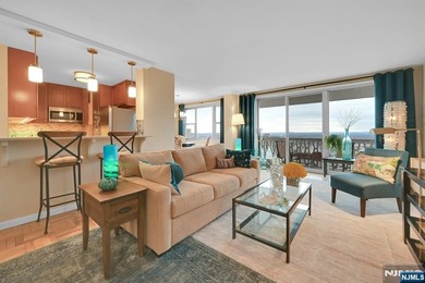 Beautifully appointed, this west facing, high floor large one