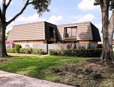 Welcome to this updated 2BR/2.5BA townhouse in the Village of - photo 1