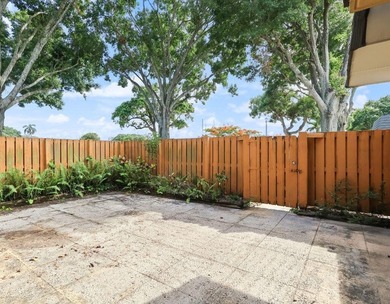Welcome to this updated 2BR/2.5BA townhouse in the Village of - photo 3
