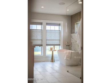 There are homes at the beach, and then there are homes that - photo 50