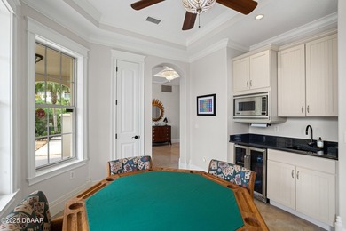 Perched on an oversized homesite in Hammock Beach, this 5,300 sq