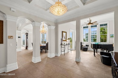 Perched on an oversized homesite in Hammock Beach, this 5,300 sq