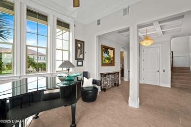 Perched on an oversized homesite in Hammock Beach, this 5,300 sq