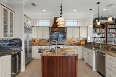 Perched on an oversized homesite in Hammock Beach, this 5,300 sq