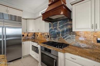 Perched on an oversized homesite in Hammock Beach, this 5,300 sq