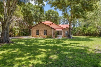 Welcome home to Holiday Pines, one of North Fort Pierce's most - photo 1