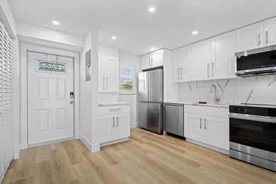 Welcome to Unit 109 at Boca House - a stunning, fully renovated - photo 2