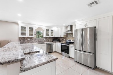 This beautifully remodeled 3-bedroom, 2-bathroom home offers - photo 12