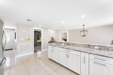 This beautifully remodeled 3-bedroom, 2-bathroom home offers - photo 13