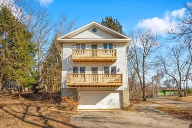 Welcome to this beautifully remodeled lake-area retreat with - photo 1