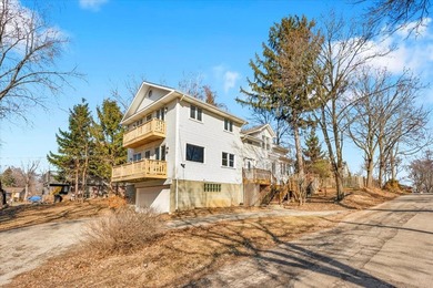 Welcome to this beautifully remodeled lake-area retreat with - photo 3