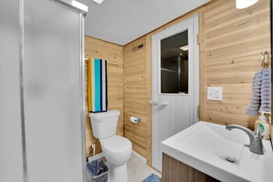 Welcome to this beautifully remodeled lake-area retreat with - photo 9