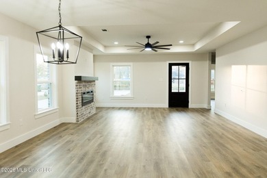 ELEGANT NEW CONSTRUCTION WITH CUSTOM DETAILS! Welcome to this - photo 3