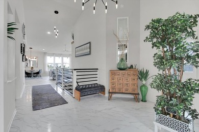 Light-filled and spacious, this open floor plan features vaulted - photo 8