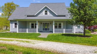 First time on the market! This 2 story country style ONE Owner - Lake Home For Sale in Sunrise  Beach, Missouri
