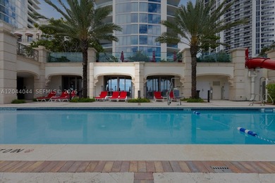 Experience the pinnacle of beachfront luxury with this - photo 2