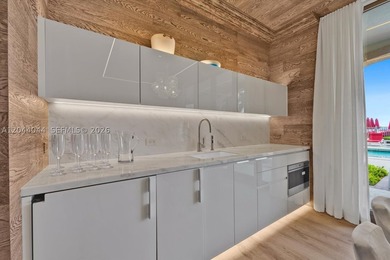 Experience the pinnacle of beachfront luxury with this - photo 8