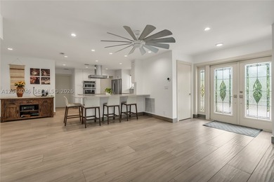 Beautifully renovated smart home in the desirable Coral Ridge - photo 2