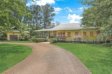Nestled on a serene pond in Slidell, this one-of-a-kind custom - photo 3