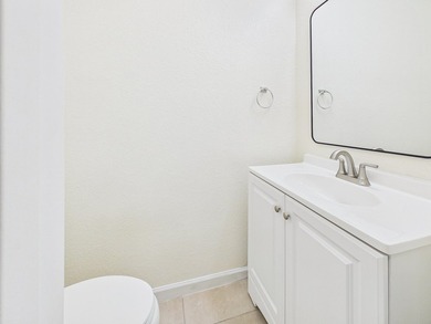 This beautifully maintained 3-bedroom, 2.5-bathroom end-unit - photo 13