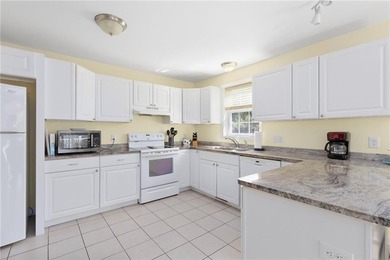 Nestled on a quiet dead-end street in Kingston, this spacious - photo 13