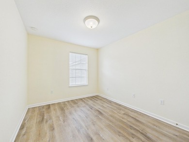 This beautifully maintained 3-bedroom, 2.5-bathroom end-unit - photo 16