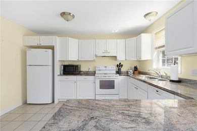 Nestled on a quiet dead-end street in Kingston, this spacious - photo 17