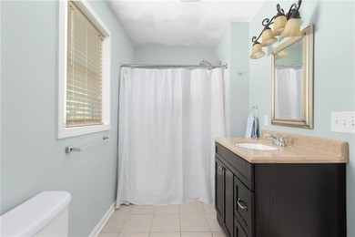 Nestled on a quiet dead-end street in Kingston, this spacious - photo 24