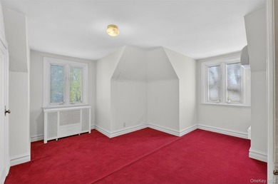 This extraordinary Tudor mansion sits on an expansive 112x100 - photo 19