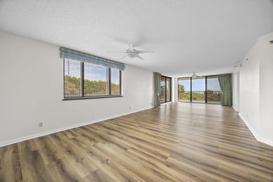 RARE 3 BEDROOM/2BATH CORNER UNIT WITH TWO GARAGES! Step inside - photo 3